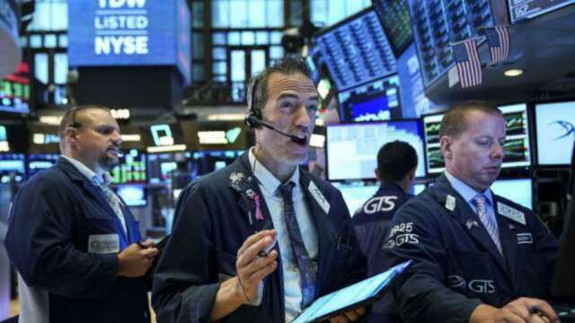 〈美股盤後〉拜登稱美國回來了 市場極度貪婪 道瓊首度登上 3 萬點。(圖片：AFP)