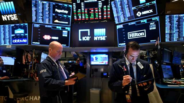 散戶大舉入市領2020年股票期權交易衝高 蘋果、特斯拉與蔚來最火熱 (圖:AFP)