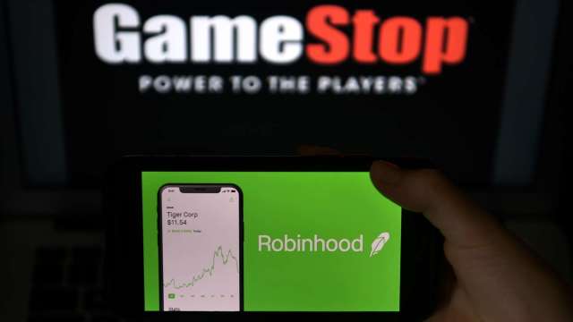 Robinhood開放有限度交易 GameStop盤後翻紅大漲50% (圖:AFP)