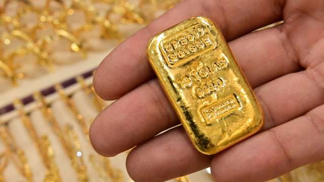 〈貴金屬盤後〉公債殖利率走強 黃金小跌 但創今年迄今首月收高 (圖片:AFP)