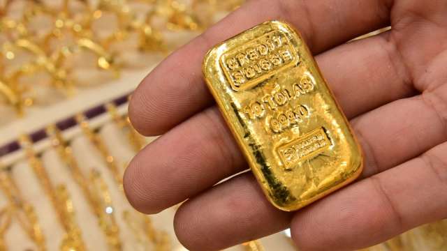 〈貴金屬盤後〉葉倫暗示升息 黃金立刻轉跌 (圖片:AFP)