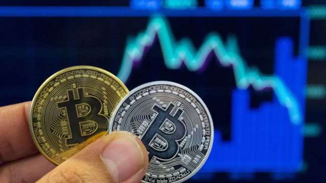 馬斯克震撼彈讓加密貨幣市值蒸發5000億美元 比特幣摔至3個月低點 (圖:AFP)