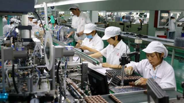 經濟部通過力成擴大投資台灣200億元,三大方案累計破1.25兆元。(圖:AFP)