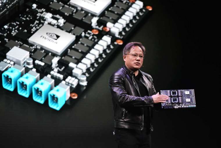 Nvidia 執行長黃仁勳有信心明年 3 月底以前完成 Arm 收購 (圖片:AFP)