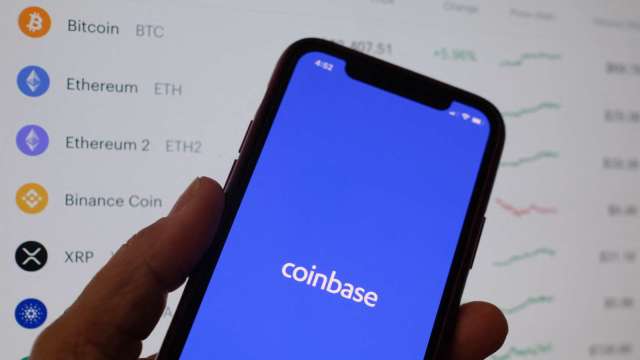 〈財報〉加密貨幣交易暴增 Coinbase Q2獲利勝預期 盤後小漲 (圖:AFP)