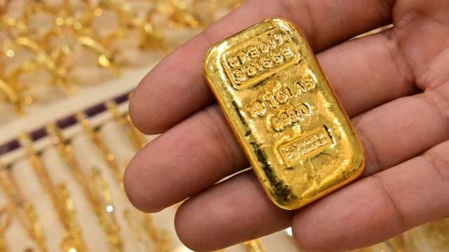 〈貴金屬盤後〉鮑爾偏鴿 未提縮表具體時間點 黃金重回1800美元上方 登4週高點 (圖片:AFP)