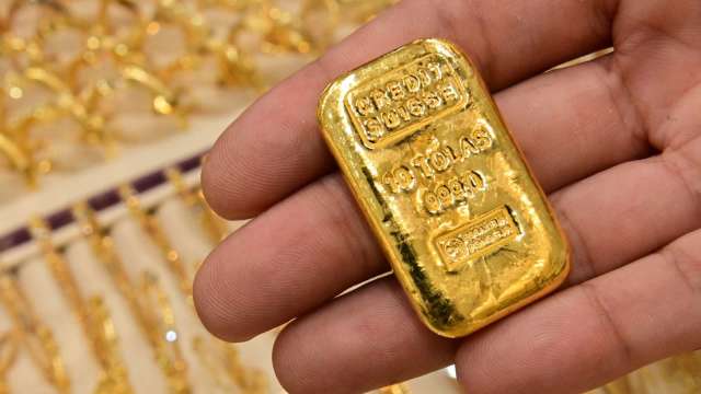 〈貴金屬盤後〉黃金跌破1800美元關卡 1個月來最大下跌 (圖片:AFP)