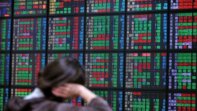 台股價漲量縮 外資交投清淡 三大法人賣超8.27億元。(圖:AFP)