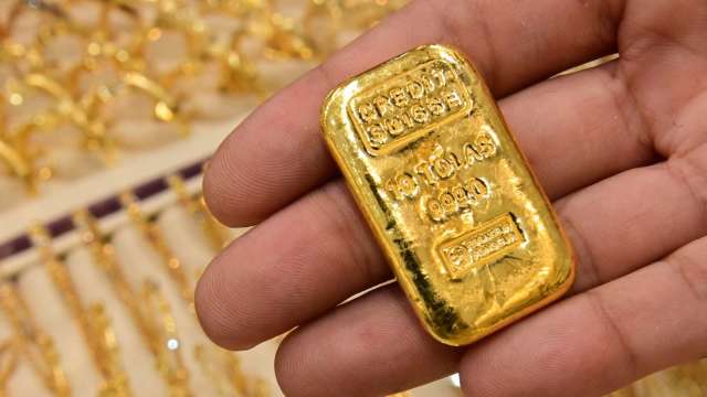 〈貴金屬盤後〉Fed會議前一週 黃金上漲 但未能突破1800美元關卡 (圖片:AFP)