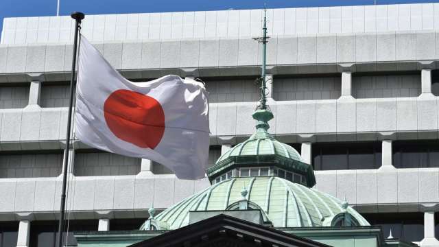 日本利率政策按兵不動 公布氣候變遷相關投融資政策 (圖片:AFP)