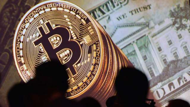 中國封殺加密貨幣不令人意外 部分投機者視此為買入機會(圖:AFP)