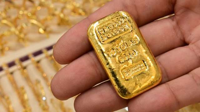 〈貴金屬盤後〉美元站上1年高點 黃金連2跌 觸及6個月低點 (圖片:AFP)