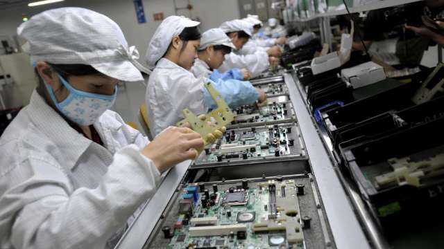 經濟部通過致伸、昇陽半等7企業，擴大投資台灣81億元。(圖:AFP)