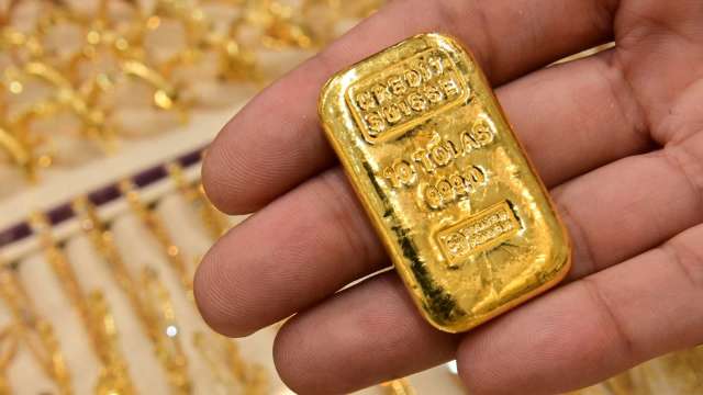 黃金觸底反彈 技術分析師:等等!現在還不到進場時候 (圖片:AFP)