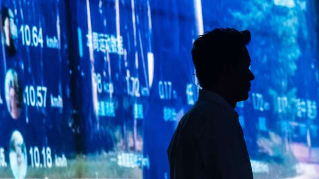 中國恐祭出「數據稅」 港股網科族群股價躺平(圖片:AFP)