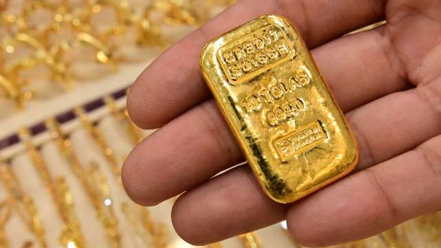 〈貴金屬盤後〉變種病毒來襲 鮑爾暗示加速縮表 黃金收低 (圖片:AFP)