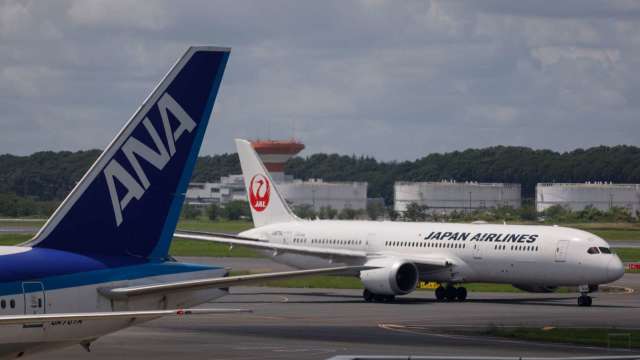 日本圍堵Omicron再祭新措施 要求全部飛往日本航班停止訂位 (圖片：AFP)