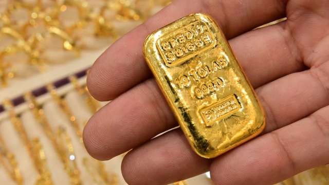 〈貴金屬盤後〉疫情未朗 市場等待CPI數據 黃金摸索方向 僅小幅收高 (圖片:AFP)