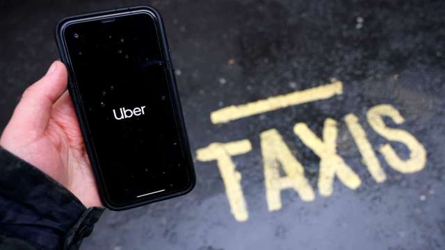 〈美股熱門股〉Uber叫車與外送業務預訂量回溫 盤中勁揚逾5%(圖片:AFP)