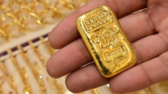 〈貴金屬盤後〉聖誕週 市場流動性低 全球賣壓大 黃金收低於1800美元 (圖片:AFP)