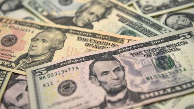 〈紐約匯市〉美元全年升值近7%寫2015年來最佳 日圓貶10%   (圖:AFP)