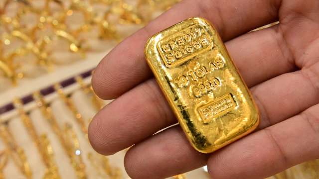 〈貴金屬盤後〉美元走強、殖利率上升 黃金承壓連3日收低 (圖片:AFP)