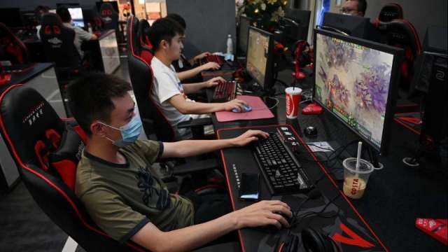 传腾讯有意将纳斯达克挂牌的子公司串流游戏媒体斗鱼私有化。（图：AFP）(photo:CnYes)