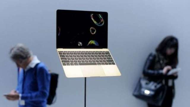 彭博：蘋果新款初階Macbook Pro將搭M2晶片 不採用MiniLED（圖：AFP）