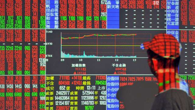 台股大漲310點 外資終止連6賣 三大法人買超149.51億元。(圖：AFP)