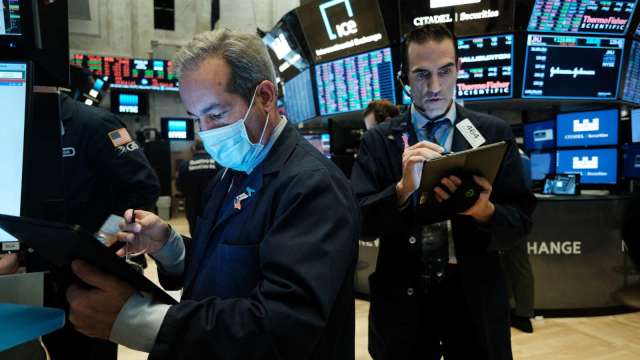 小摩CEO戴蒙：小心 美國經濟暴風雲來襲！(圖片:AFP)