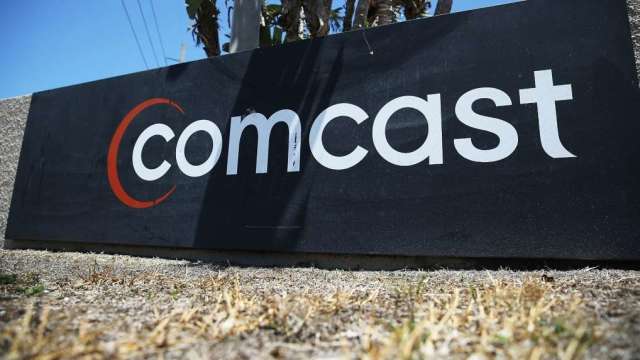Comcast成功测试空心光纤 传送速率快1.5倍高达400Gps（图：AFP）(photo:CnYes)