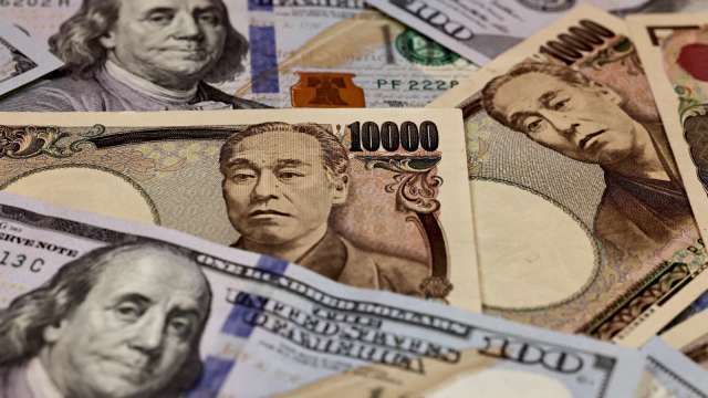 日圓重貶，亞洲散戶搶買日圓。(圖: AFP)