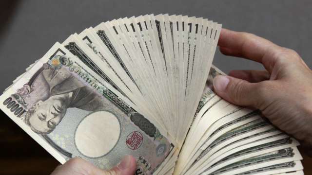 日本首相與央行總裁重申：將合作因應匯率波動(圖:AFP)