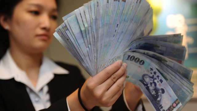 〈台幣〉股匯齊揚小升收29.715元 交投偏淡。(圖：AFP)