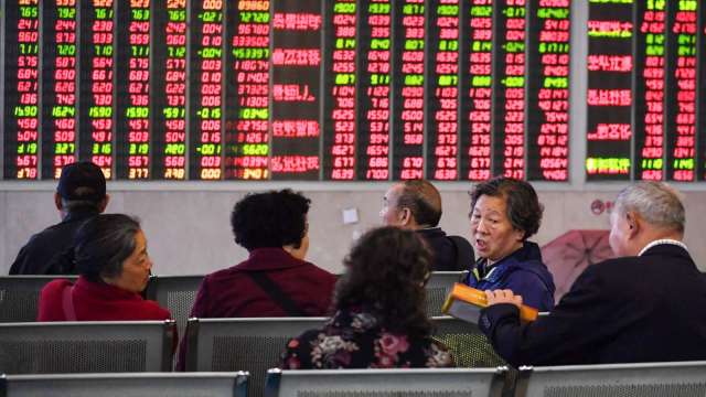 中國A股三大指數周四收盤同步大漲。(圖: AFP)
