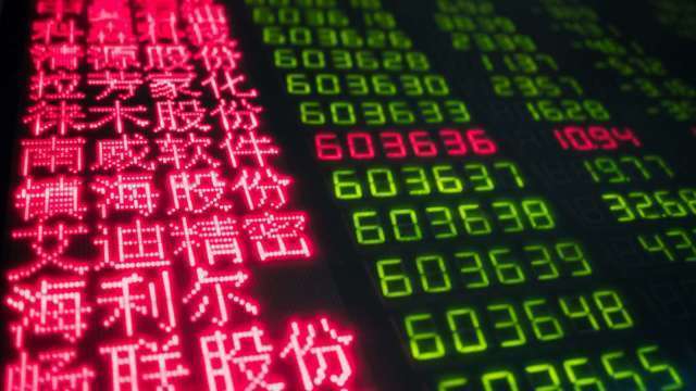 中國擬設「爛尾樓」還貸緩衝期，A股漲跌互見。(圖: AFP)