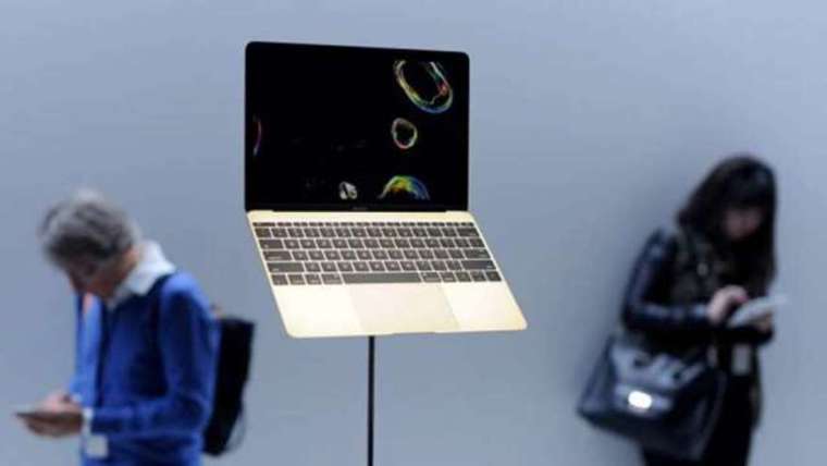 蘋果 Q3 Mac 業務的營收意外下滑 (圖: AFP)