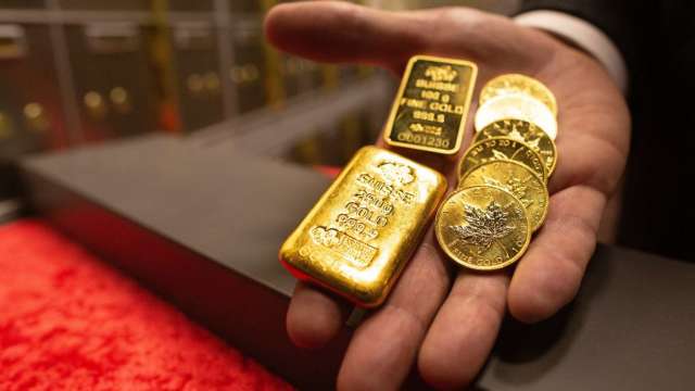 〈貴金屬盤後〉中國數據壞消息、美元反彈 黃金期貨跌破1800美元關卡 (圖:AFP)