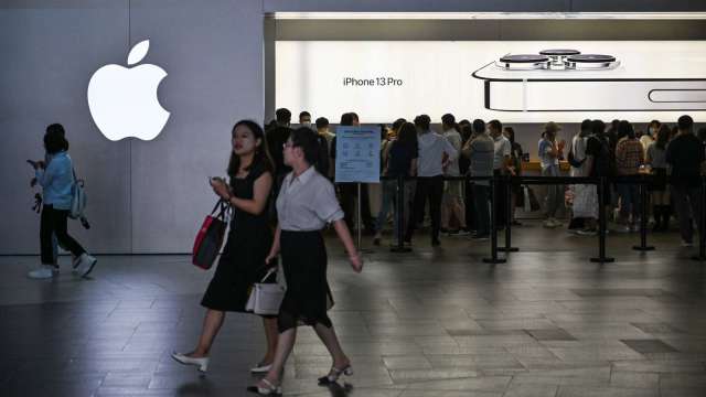 蘋果傳解僱百名員工。(圖: AFP)