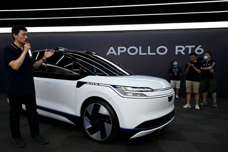 百度旗下「蘿蔔快跑」（Apollo Go）無人駕駛計程車。(圖片：AFP)