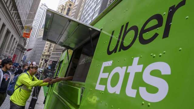Uber與Nuro合作推動無人自駕車外送食物及雜貨。（圖：AFP）