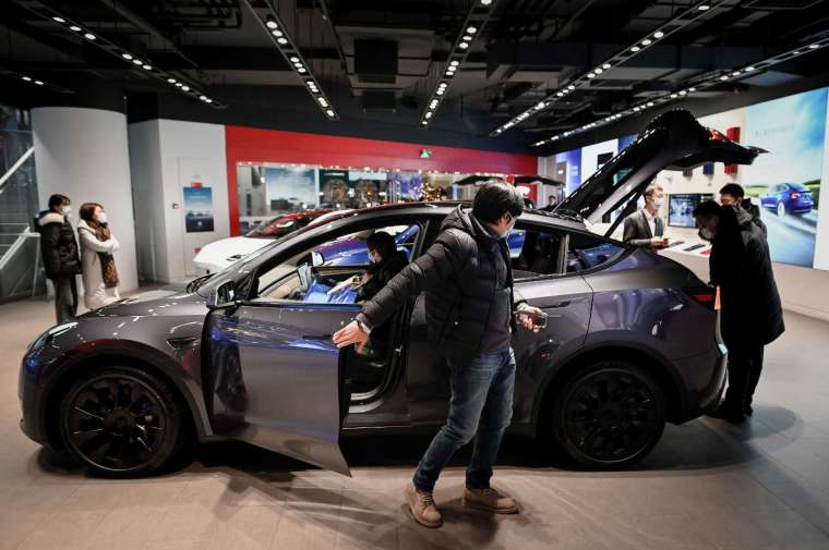 近 80% 的受訪者表示，他們不會為配備自動駕駛技術的汽車支付更多費用 (圖片：AFP)