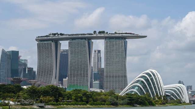 新加坡擠下香港 躍升亞洲最大金融中心 全球排名第三 (圖：AFP)