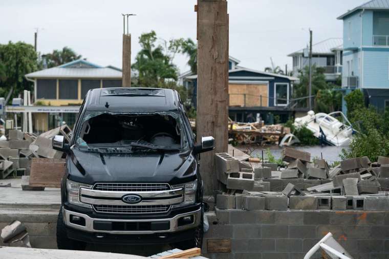 颶風伊恩威力強大，經濟損失可觀。(圖: AFP)