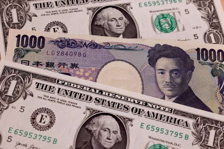 今年美元瘋狂飆漲，在全球經濟和金融市場引發劇烈震盪。(圖：AFP)