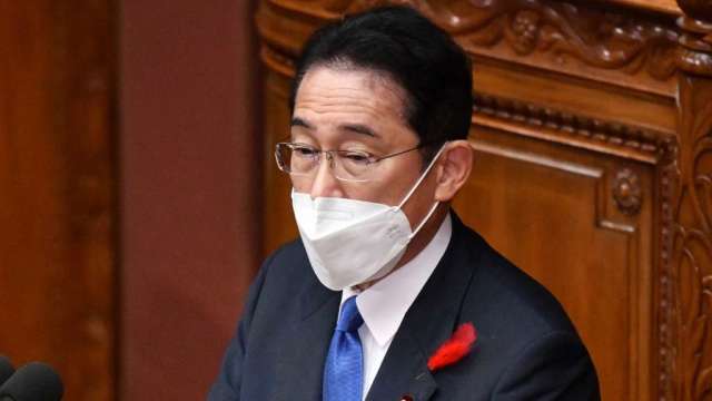 日本首相：支持央行超寬鬆政策 直到薪資上漲(圖:AFP)