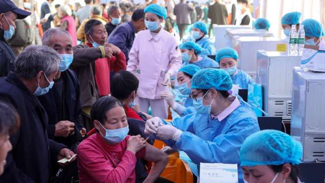 重慶疫情嚴竣，今通知民眾「非必要不離渝」。(圖: AFP)