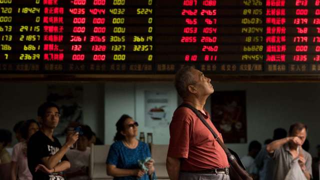 中國新增確診病例逼近高峰，A股漲跌互見。(圖: AFP)