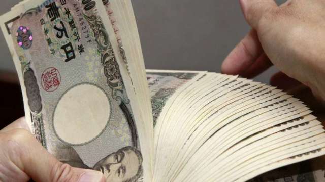 日元大貶吸引私募資金衝向日本 貝恩資本最為積極(圖:AFP)