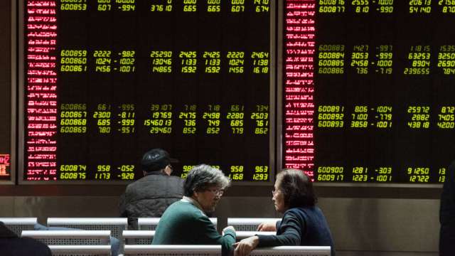 市場觀察中國是否進一步鬆綁清零政策，A股、港股大漲。(圖: AFP)